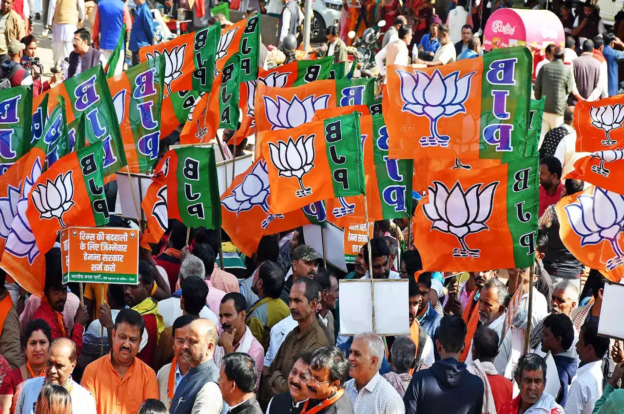 "Dynamic BJP rally filled with enthusiastic supporters waving party flags, highlighting the intense campaign for the 2024 Lok Sabha Elections."