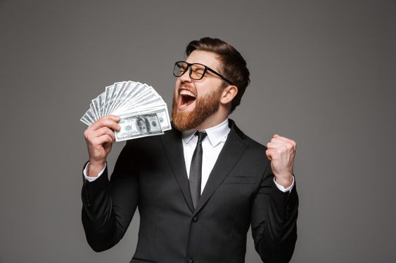 a man in a suit holding money and looking very happy to earn mony from chatgpt